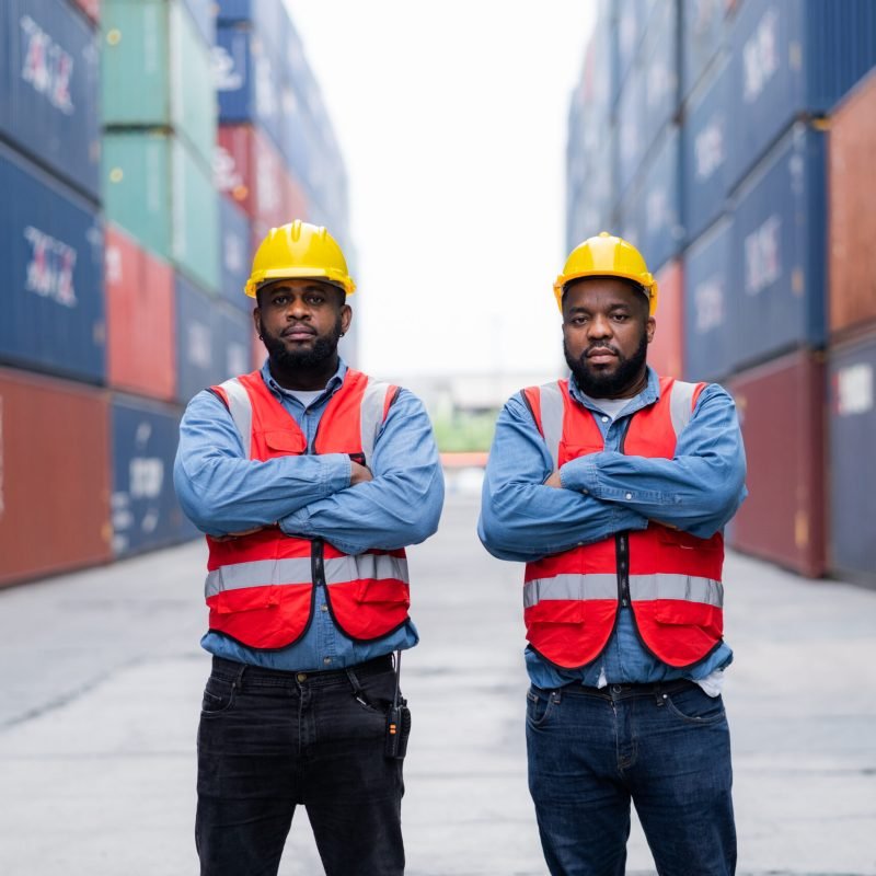 Engineer shipping container background Industrial transport and logistics concept Teamwork concept.